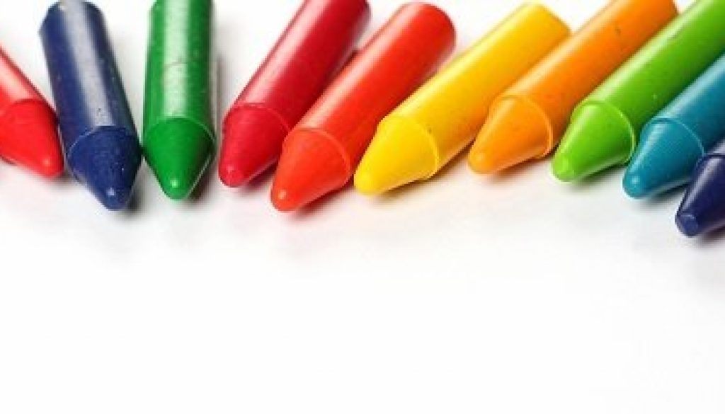 Oil pastel crayons lying on a paper