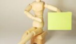 Image of a wooden man for an article about choosing the best RFP software.