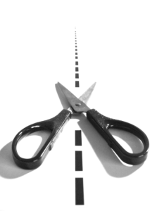 Image of black scissors opened on a white background for an article about How eAuction Software Simplifies Sourcing.